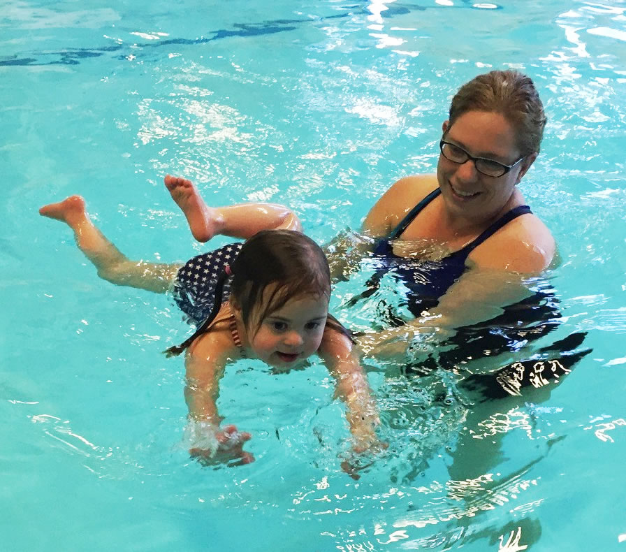 Child learning to swim